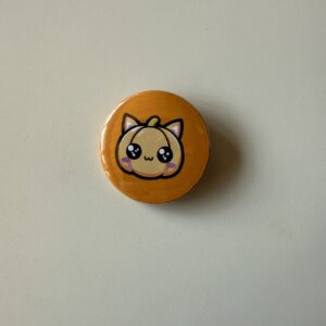 Badge chat-citrouille
